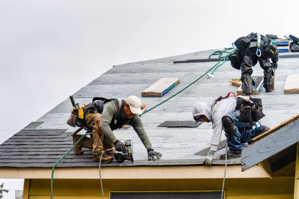 Professional Gutter Installation technician working in East Dennis, MA